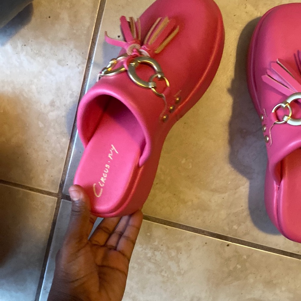A pink jinger clog